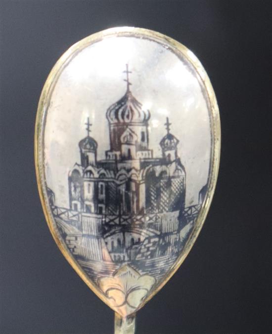 A 19th century Russian niello and silver-gilt spoon.